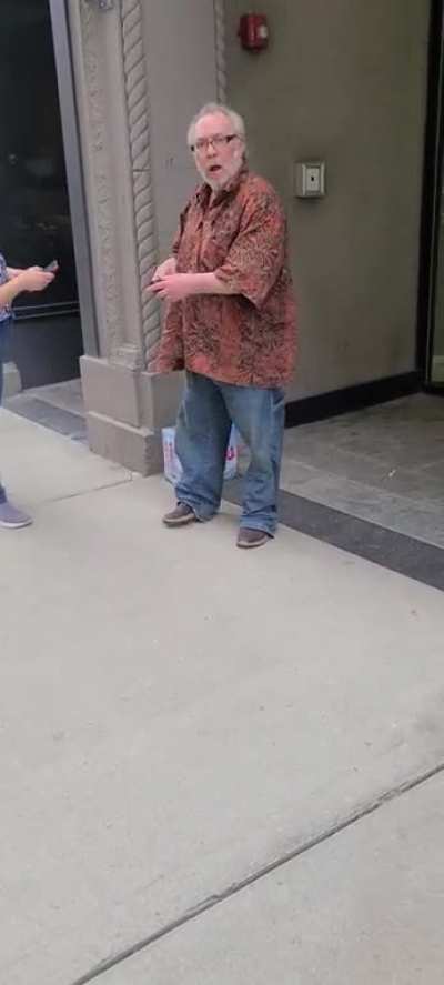 I step outside my building to walk my dog, my crazy, perpetually drunk neighbor waiting for his Drizly order says 