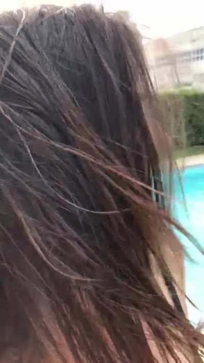 Combing her hair