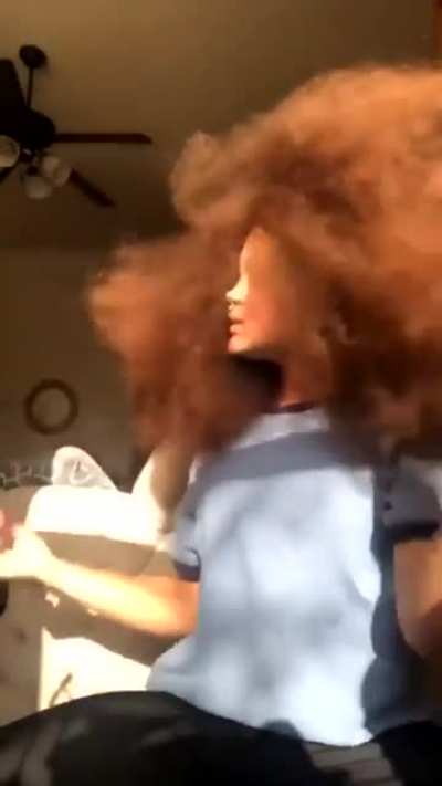 This woman Afro.