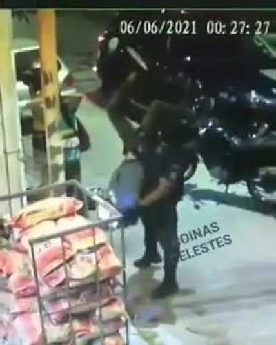 Suddenly while searching the suspect the Police Officer flips and shakes the man like he was cleaning out a trash can.