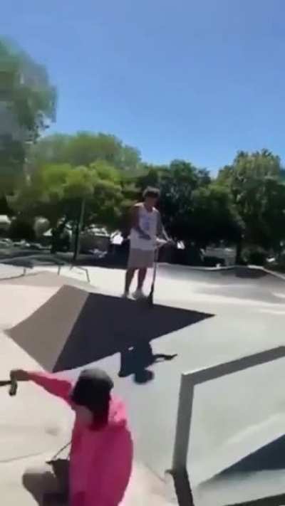 riding scooter on a railing.........
