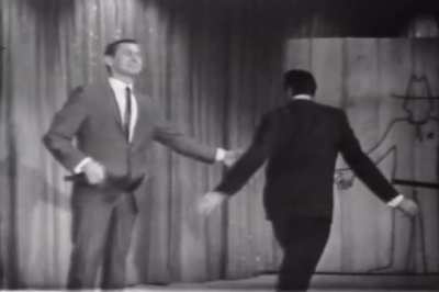 Ed Ames teaching Johnny Carson how to throw a tomahawk on The Tonight Show in 1965. A legendary moment, one of the longest laughs from a studio audience ever recorded on television