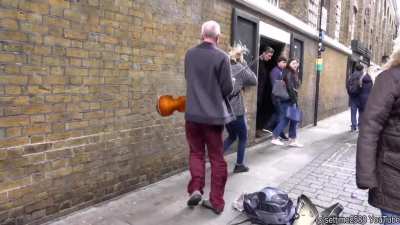 Street violinist does his thing