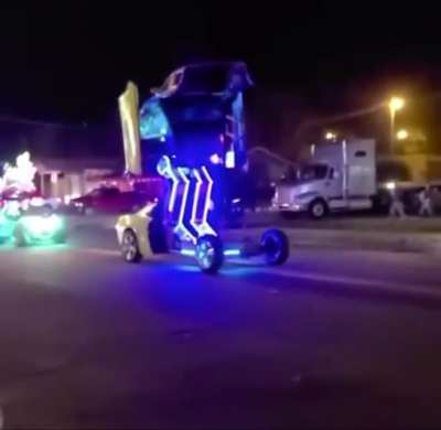 D: the car breaks apart D: