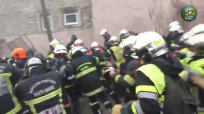 French police charging firefighters, firefighters not having any of it