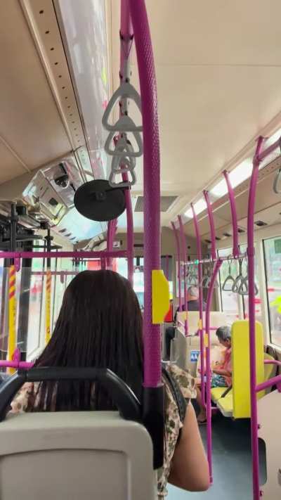Someone is blasting out loud music on the bus and disturbing the entire bus