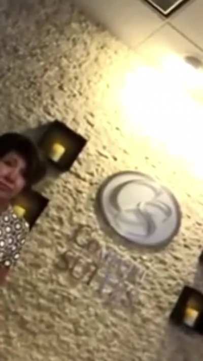 Hotel worker tries accusing customer of smoking in their room, admits to lying about it and proceeds to assault them on camera while another worker watches