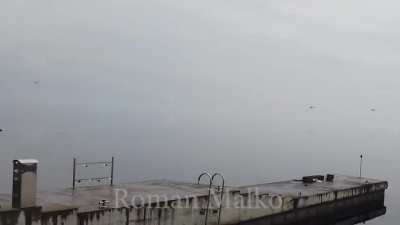 Russian helicopter being shot down, possibly over the Kyiv Reservoir. Filmed from near Mezhyhirya: 50.614716, 30.484441