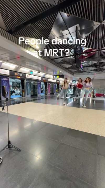 People dancing at MRT? Need new sign board?
