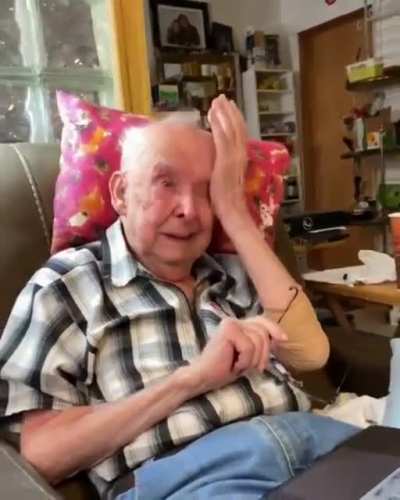 Old man sees animated photo of his deceased wife.