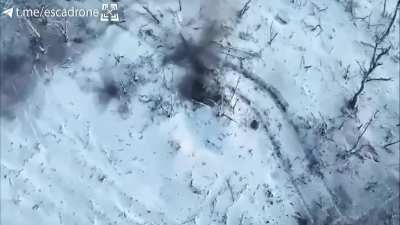 Ukrainian FPV drone strikes several Russian soldiers sitting close together in a trench. Escadrone video.
