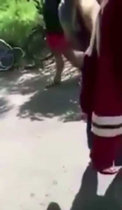 after getting beaten, girl forced to get on her hands and knees to kiss feet.. ends up getting head stomped to the ground.