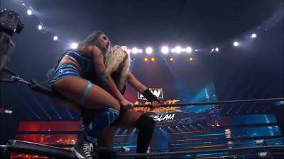 Skye Blue crotched on the turnbuckle by Julia Hart