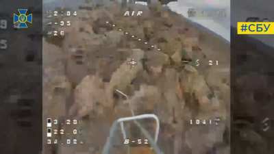 Russian soldiers chilling on military vehicle hit by UA kamikaze drone