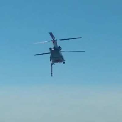 Fire fighting Chinhook off to help some of our guys in the BWCAW. 28,600 gallons of water in a 40 minute work cycle then they released him.