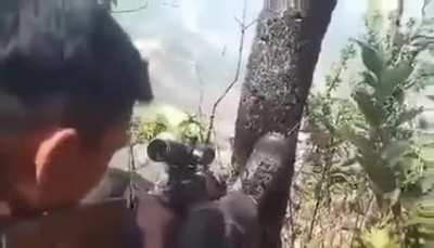 Chinland Defense Force-Hakha (CDF) Sniper Shooting at Myanmar Junta Soldiers in Zokhua Village while his Buddies Shoot the Shit (March 28, 2022)