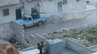FSA operating a cannibalized BMP-1 technical against the al-Muhallab Military Barracks outside of Aleppo - 1/31/2013