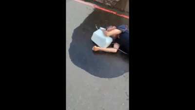Psycho with a spray gun full of gasoline and blowtorch tries to set father and son on fire and gets KO'ed