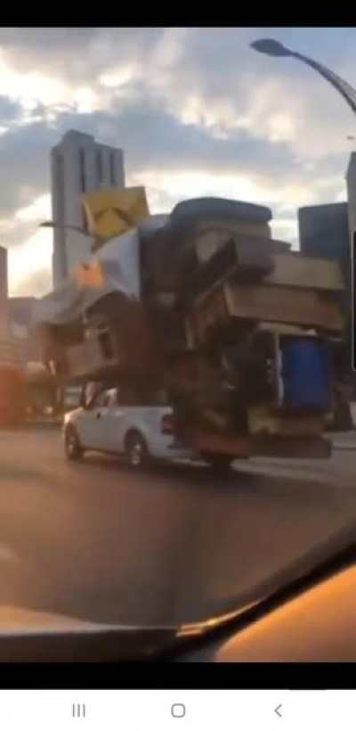 Somewhere in Mexico City. If only they had a government as dependable as the suspension on this truck.