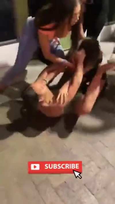 Girls fighting outside the club