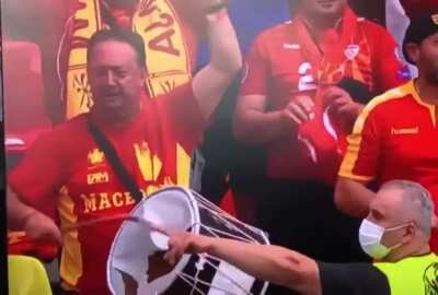 Macedonia fan hitting the drum
