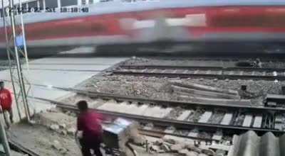 Trying to cross the tracks when the barricade is down