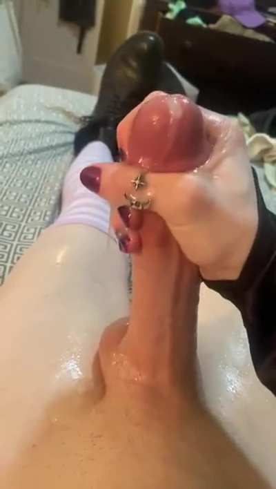 Oiled goth femboy cums over themselves