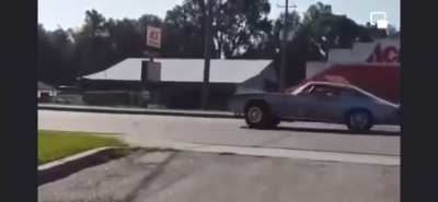 Idiot in.. then out of his car