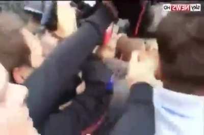 Angry Mob Tosses Ukrainian Politician Into the Trash