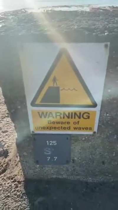 Warning on the beach.