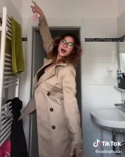 she poses in bathroom before going out
