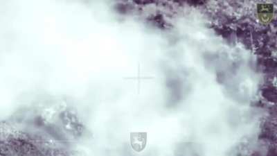 Russian soldier standing and looking around in a field is directly hit by a fast FPV drone