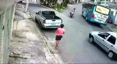 Reckless motorcycle rider with no gear.