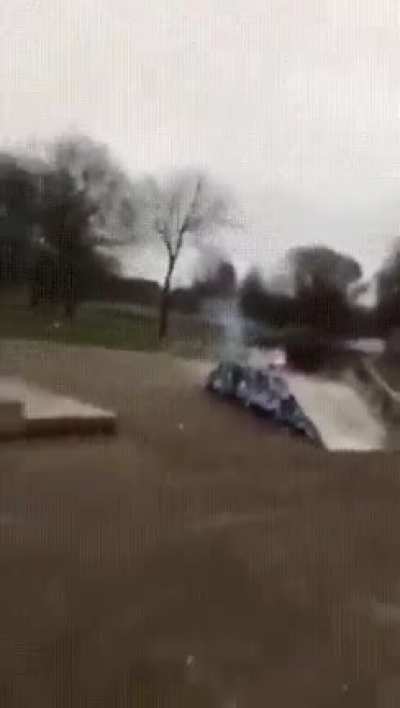 Surrounding a large firecracker in bottles of gasoline