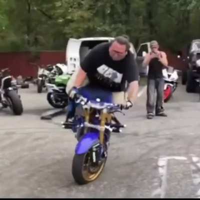 Man executes a perfect stoppie