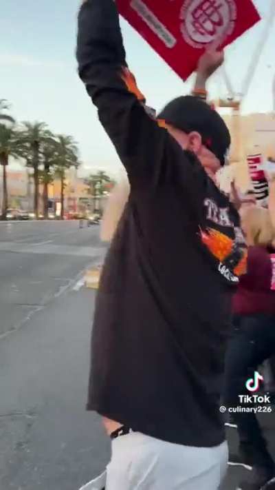Hospitality Workers participate in civil disobedience as they protest on the Las Vegas strip for a better union contract 