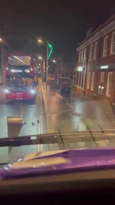 Crazy man slamming trash bins.
