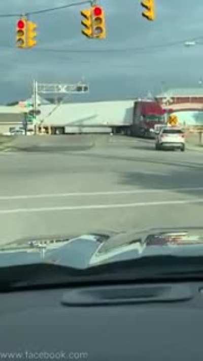 Truck get stuck on tracks, different angle.