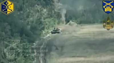 A Ukrainian FPV pilot flies his quad through the open hatch of a Russian T-90M 