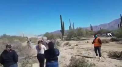 Walking onto an active desert race course...