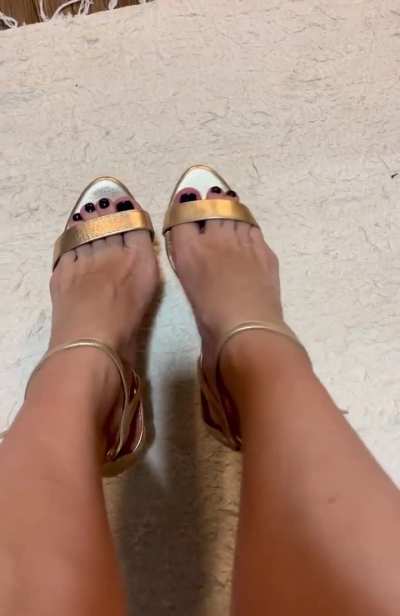 Gold high heels