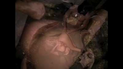 Jenna Jameson gets an “acci<wbr>denta<wbr>l” poke in the ass from Brad Armstrong (around 14 seconds in) that brings a smile to her face in Jenna Ink. 1996
