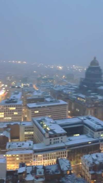 Snowy rooftop view in Brussels - from top of 'The Hotel'