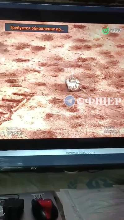 A Ukrainian soldier threw a grenade into the hatch of a Russian tank while approaching it closely