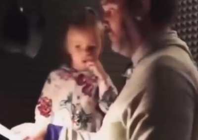 A sweet little kid recording her voice acting lines