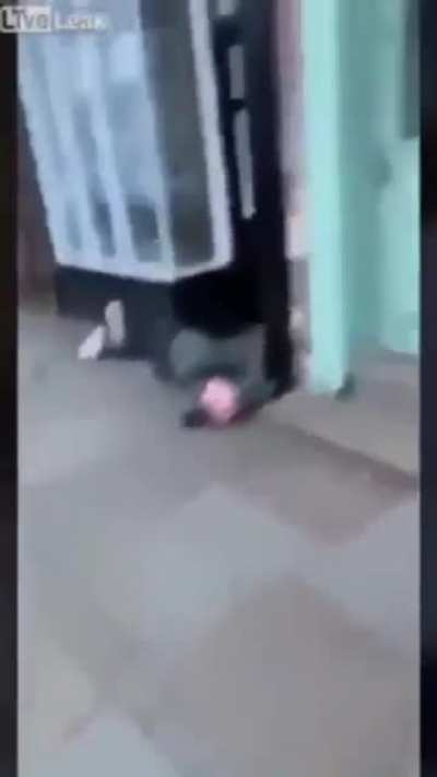 Headbutting the store sign