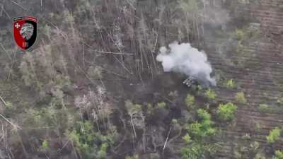 Ukrainian tank fires at a Russian trench before infantry clears it out. Tank takes a hit from a mortar. April 2024 (music from source)