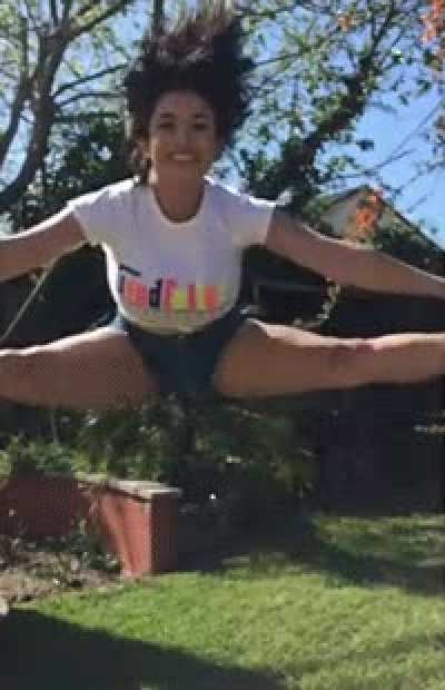 She’s proud of her jump split and big titties!