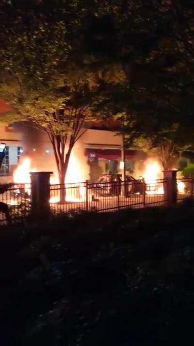 Burning police cars in ATL...National guard in route