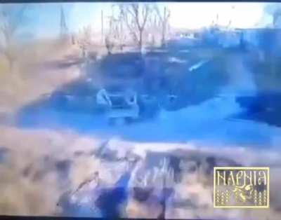 A Russian soldier tries to avoid being hit by an FPV drone by jumping off a motorcycle on the move